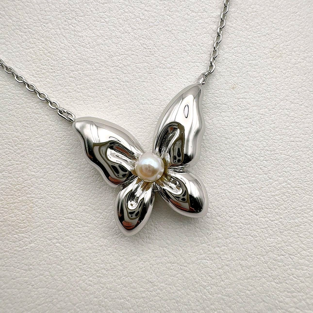 Mikimoto Butterfly necklace featuring sterling silver and 4mm pearl on a 43cm chain