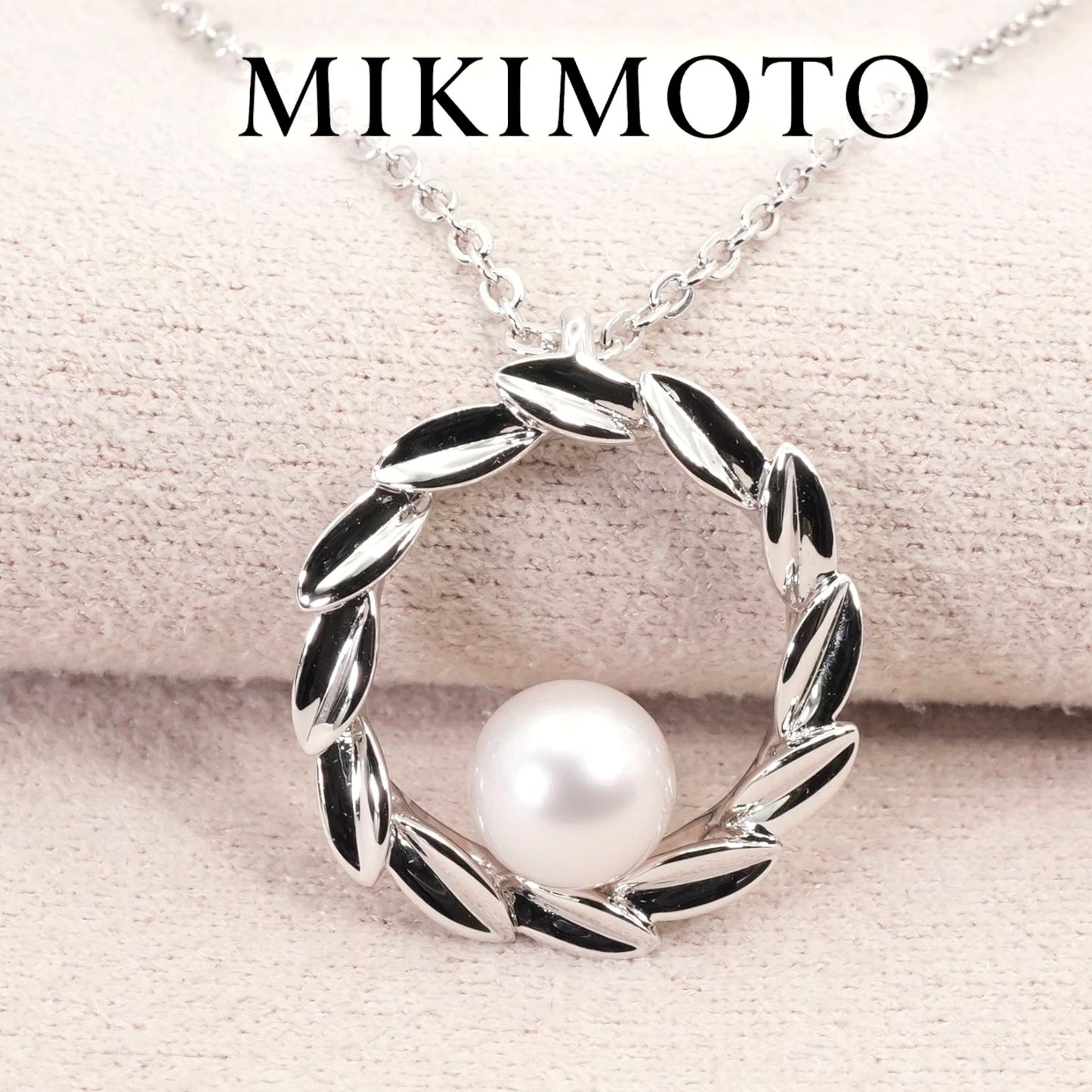 Mikimoto Silver Circle Necklace with Akoya pearls model 26-0646 in silver, clean and polished