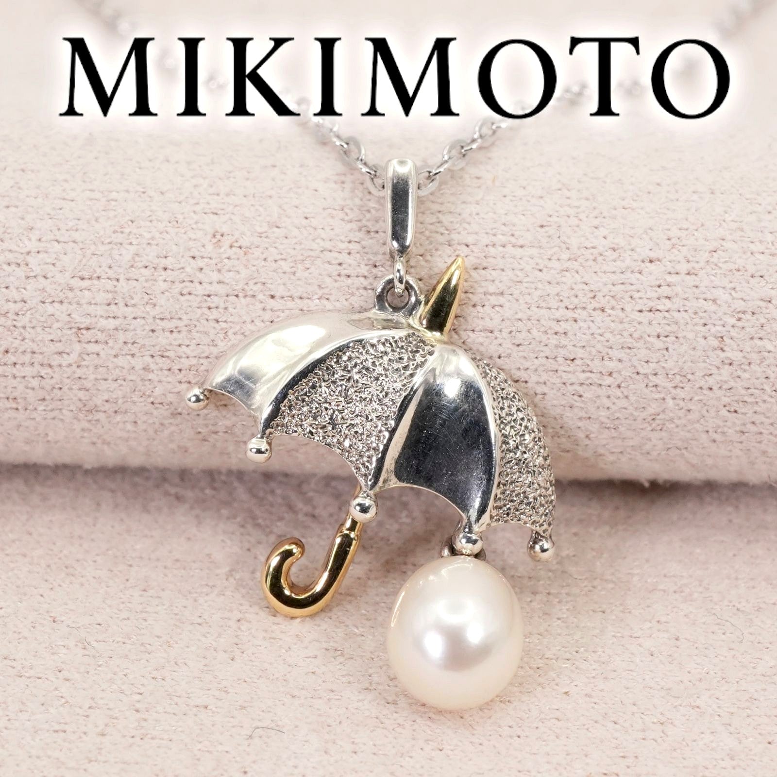 Mikimoto umbrella-shaped necklace in silver and K18 featuring a single pearl