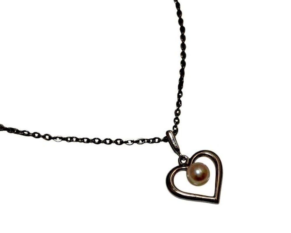 Mikimoto necklace featuring a 38mm baby pearl heart pendant on a 38cm silver chain