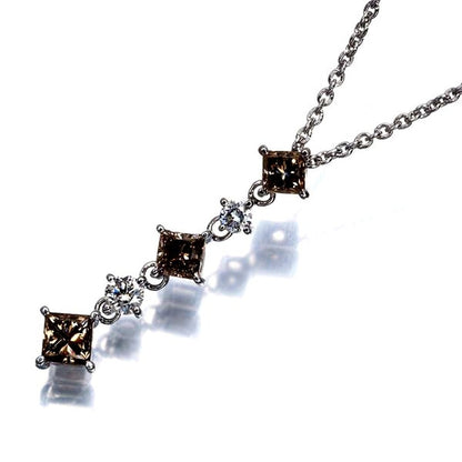Mikimoto necklace featuring brown and clear diamonds in princess cut set in 18K white gold on a 40cm chain