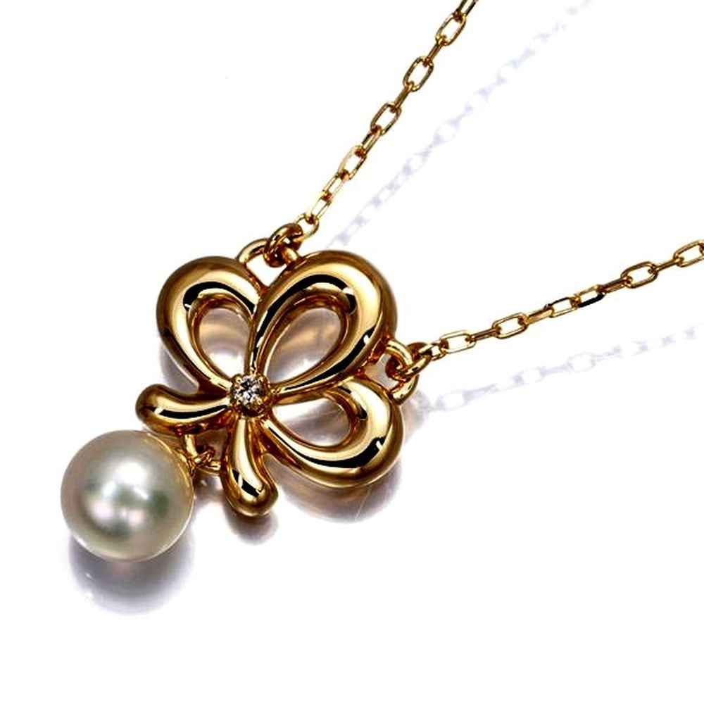 Mikimoto necklace with 5.7mm pearl and diamond set in 18 karat yellow gold with 39 cm chain