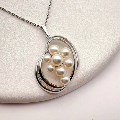 Mikimoto grape motif necklace in silver tone featuring a 5mm pearl and 45cm silver chain