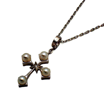 Mikimoto silver cross necklace featuring four small pearls and adjustable chain
