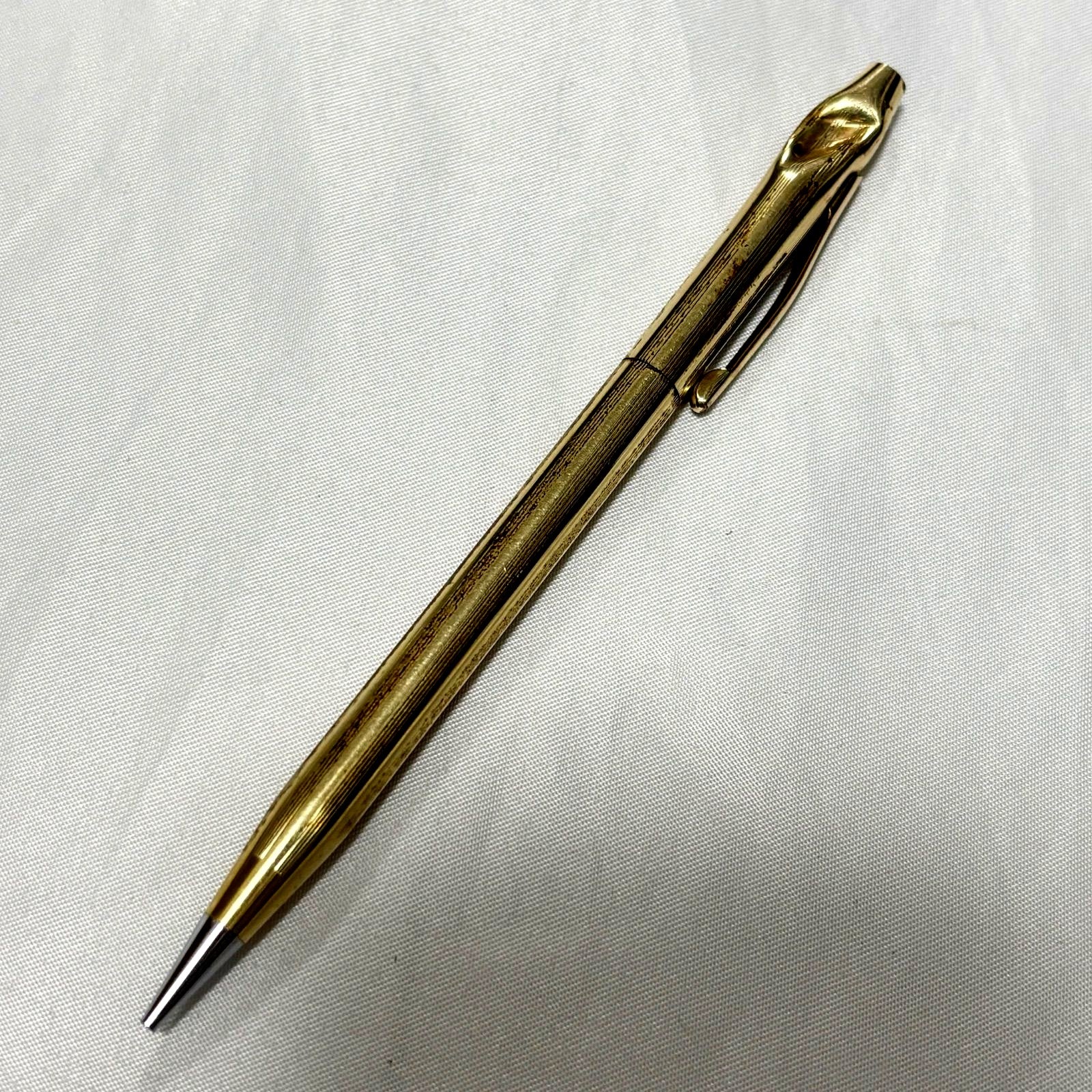 Gold Cross Century Classic mechanical pencil with minor scratches and dents shown