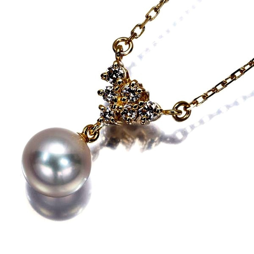 Mikimoto necklace featuring a 7.6mm Akoya pearl pendant with diamond accents set in 18K yellow gold on a 39cm chain