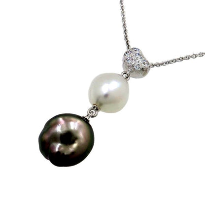 Mikimoto Baroque Pearl Necklace in white gold with white and kuro pearls featuring butterfly motif