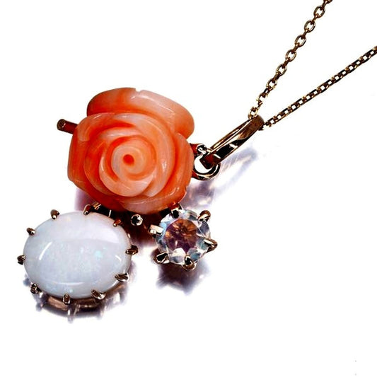 Agete agate necklace featuring coral, opal, and moonstone on 10 karat pink gold chain, size 40-45 cm