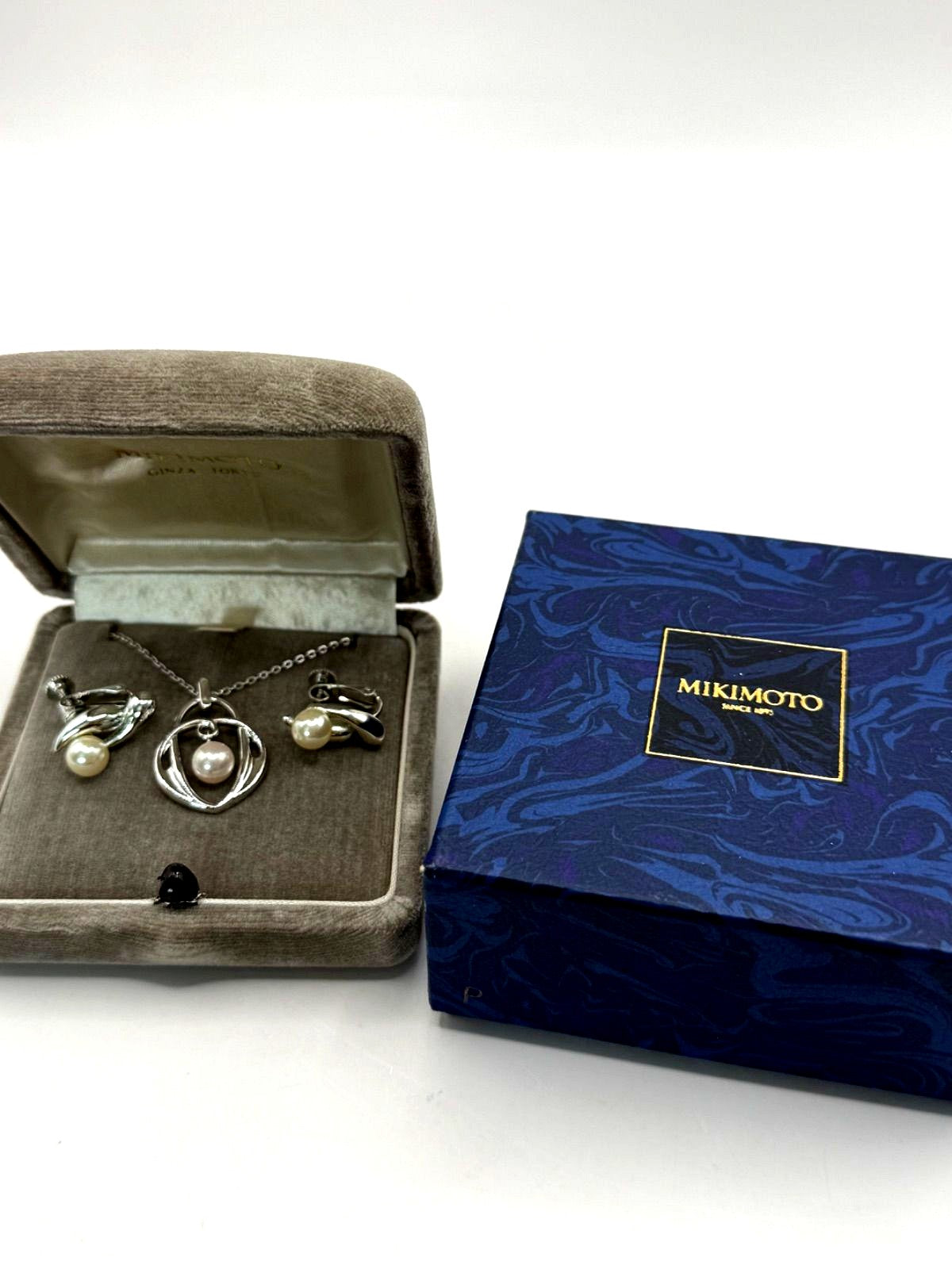 Used Mikimoto Akoya pearl necklace and matching earrings set in sterling silver with M within M logo