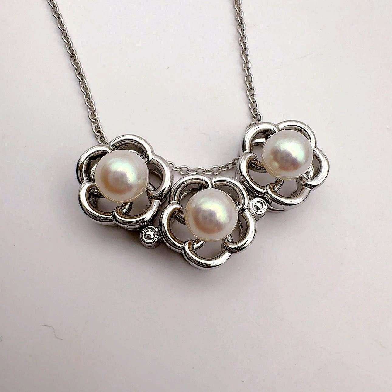 Tasaki pearl necklace featuring 6.2mm pearls, 41.5cm chain, and 1.1cm by 3.4cm pendant