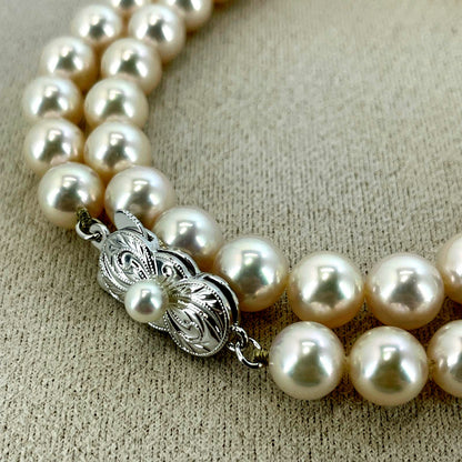 Beautiful Mikimoto pearl necklace with silver chain, model 24-2158M, detailed pearls visible