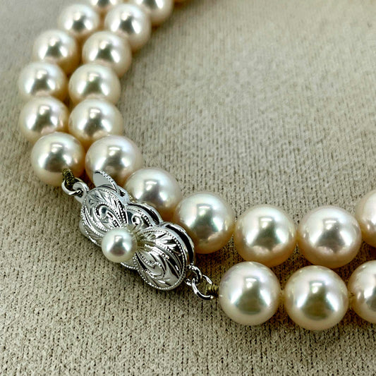 Beautiful Mikimoto pearl necklace with silver chain, model 24-2158M, detailed pearls visible