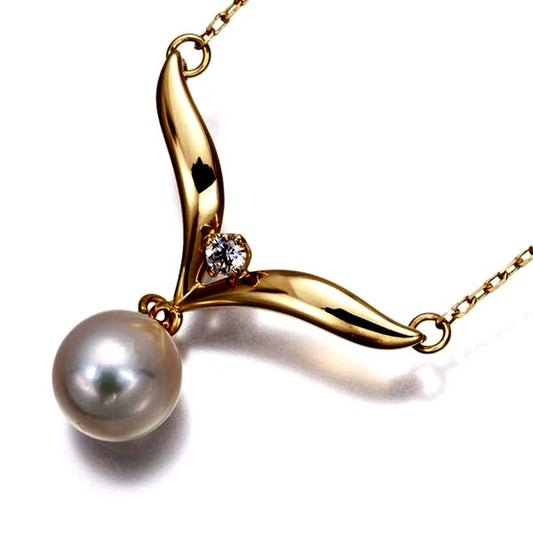 Mikimoto 7.0mm pearl necklace with diamond accents set in 18K yellow gold, 42cm length