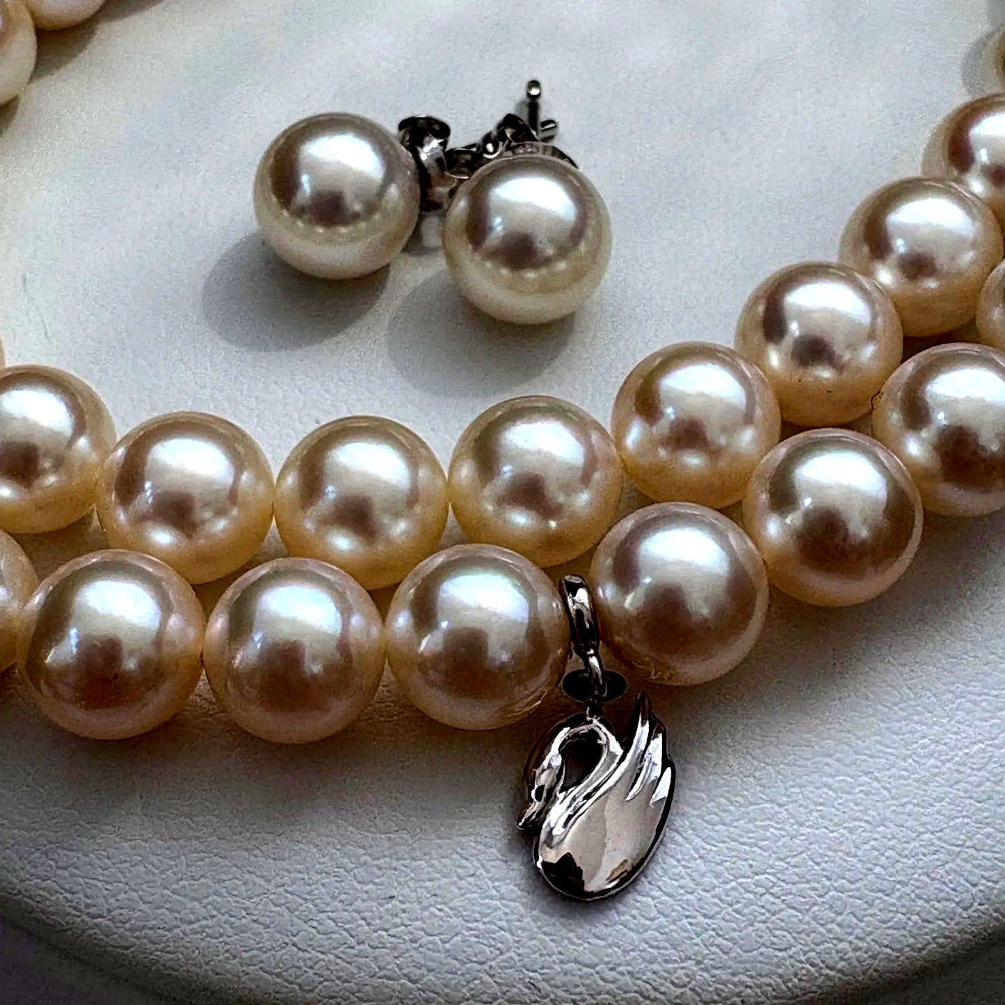 Tasaki Akoya pearl necklace and earrings set with swan charm and certificate