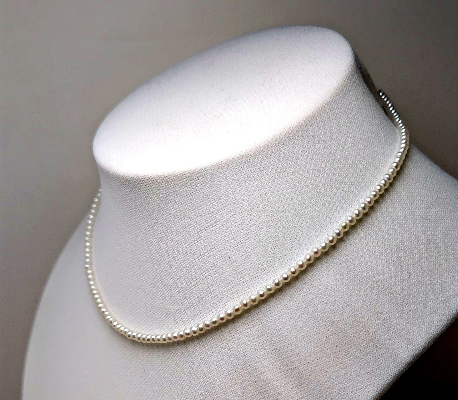 Baby 3mm white Akoya and freshwater pearl necklace with semi-round pearls and good luster