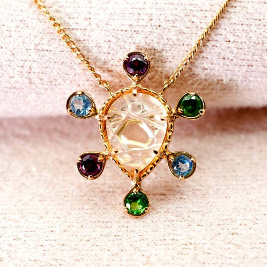 Agete K10 multi-color stone necklace model 24-4457 laid flat showing elegant design