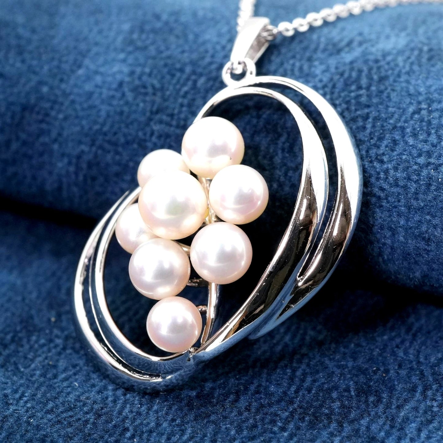 Mikimoto Silver Akoya Pearl Pendant Necklace with a single white pearl on a silver chain
