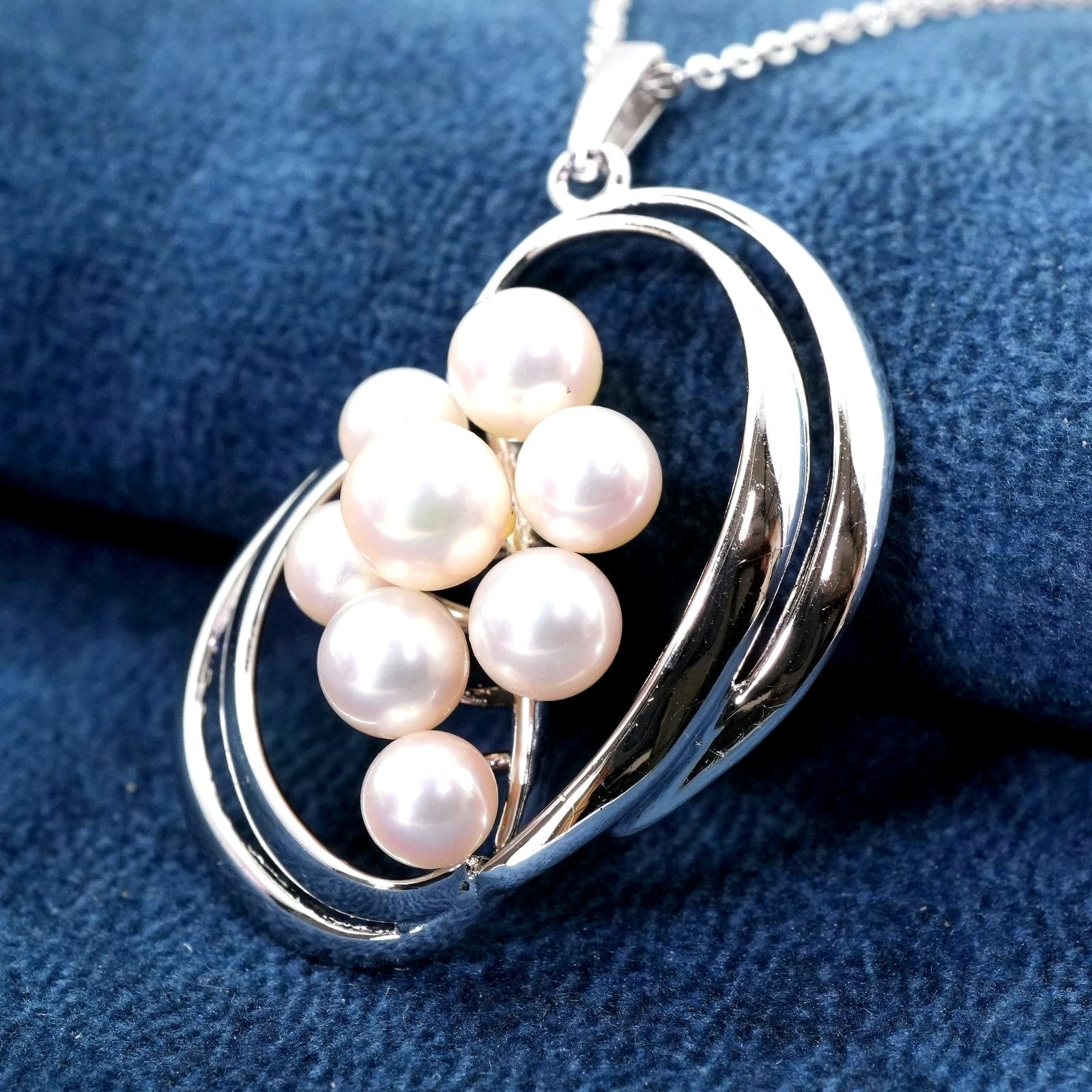 Mikimoto Silver Akoya Pearl Pendant Necklace with a single white pearl on a silver chain