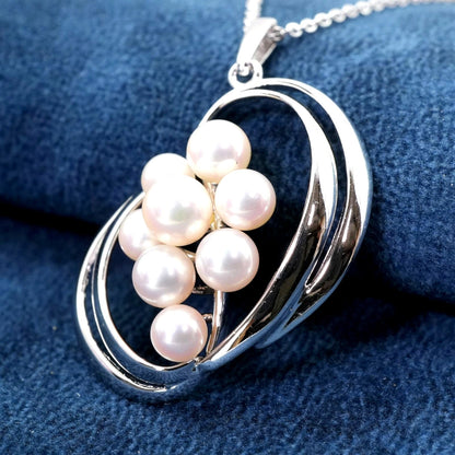 Mikimoto Silver Akoya Pearl Pendant Necklace with a single white pearl on a silver chain