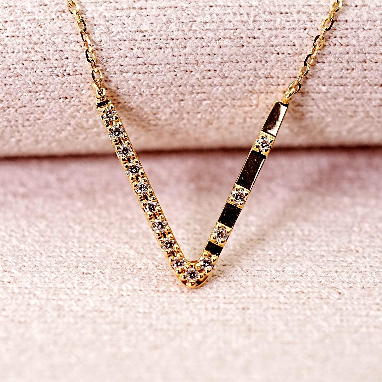 Agete K18 V Line Diamond Necklace 25-1402S featuring 0.04ct diamonds on a refined V line design