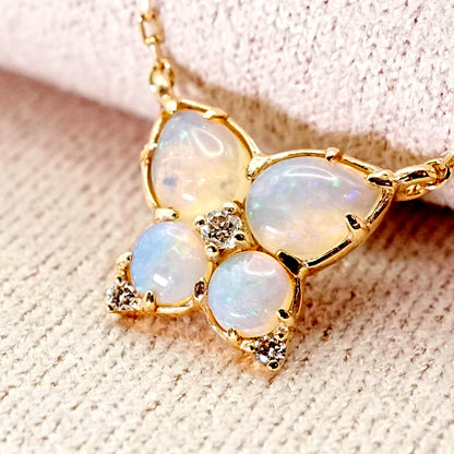 Agaat butterfly necklace with K14 gold, opal stone, and small diamond on delicate chain