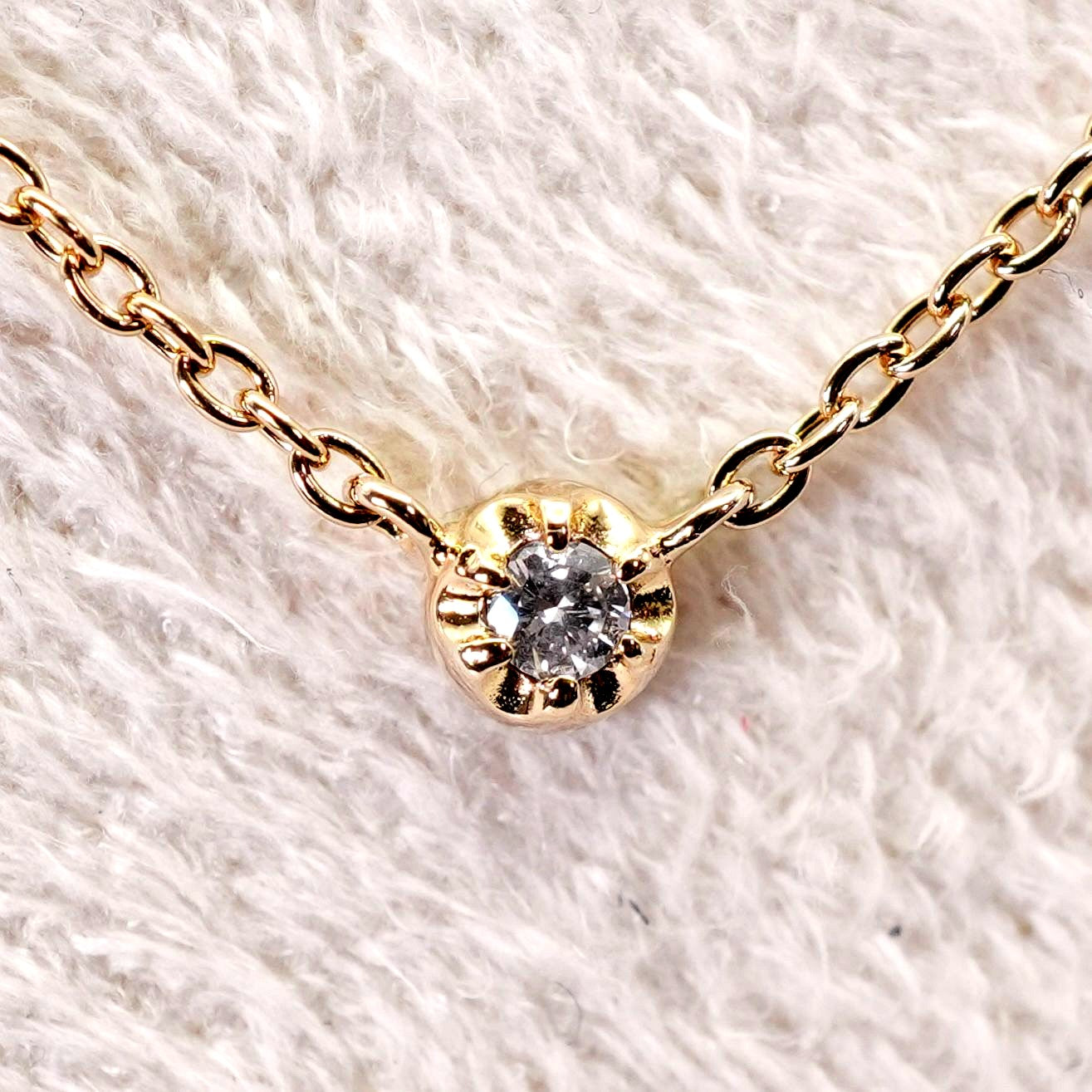 Agete K10 gold necklace with 0.02ct diamond pendant model 24-3286 on white background