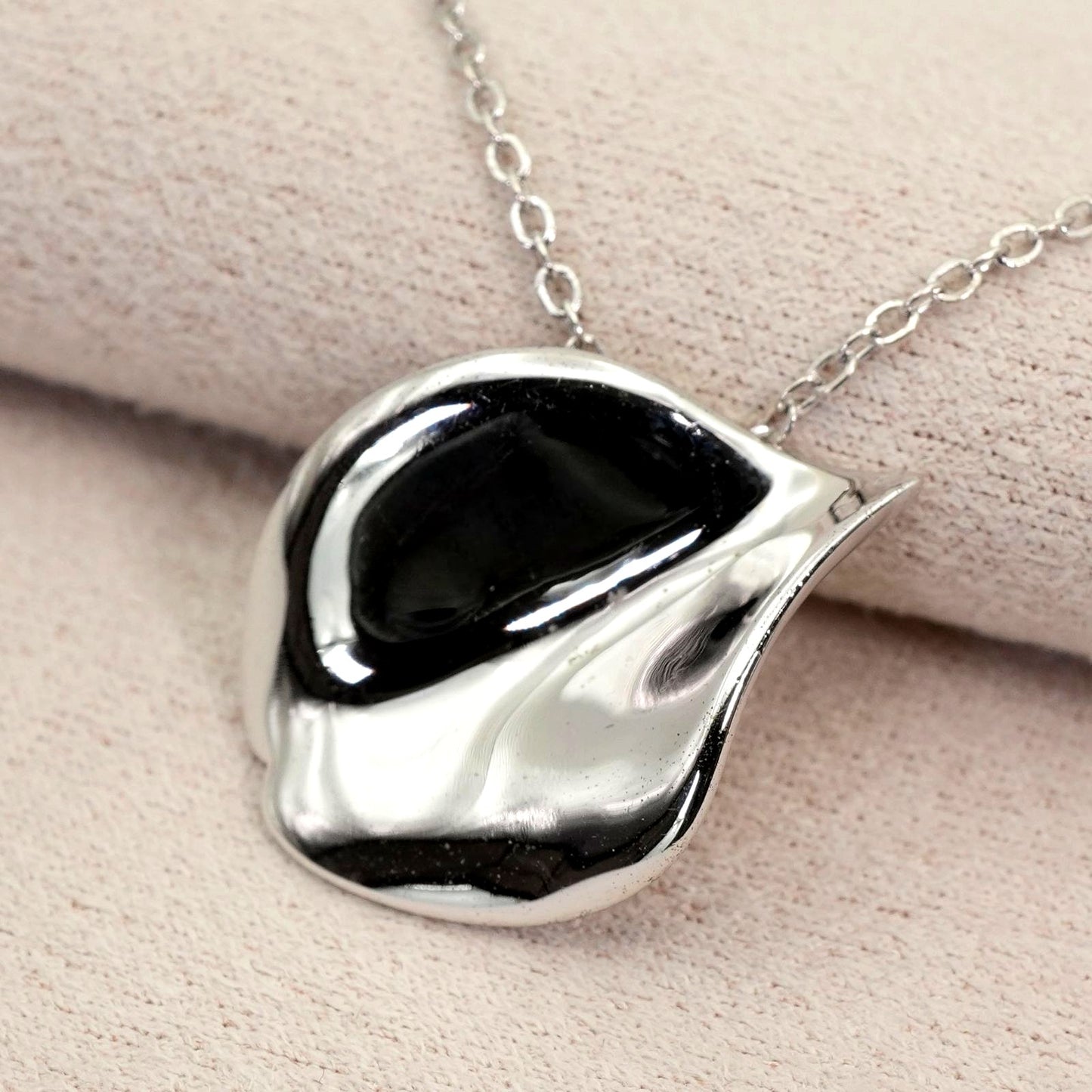 Mikimoto Petal Necklace featuring a Vandome silver pendant on a delicate chain