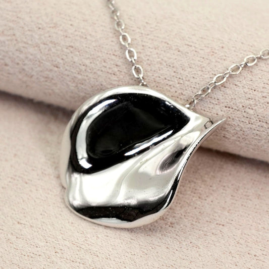 Mikimoto Petal Necklace featuring a Vandome silver pendant on a delicate chain