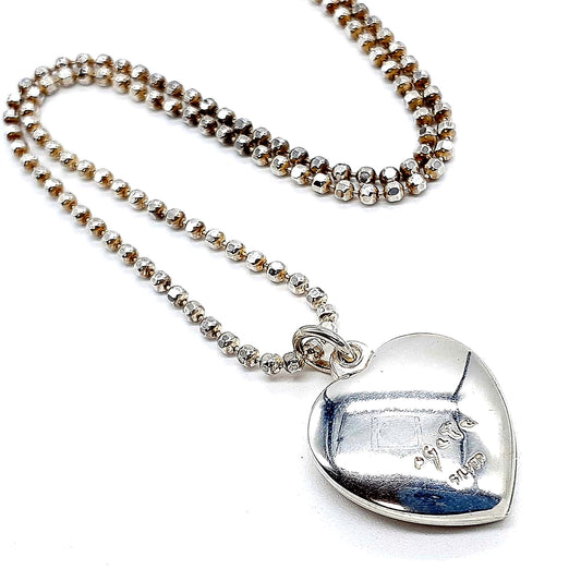Agete heart-shaped silver necklace with heart rocket and clover charm on silver chain