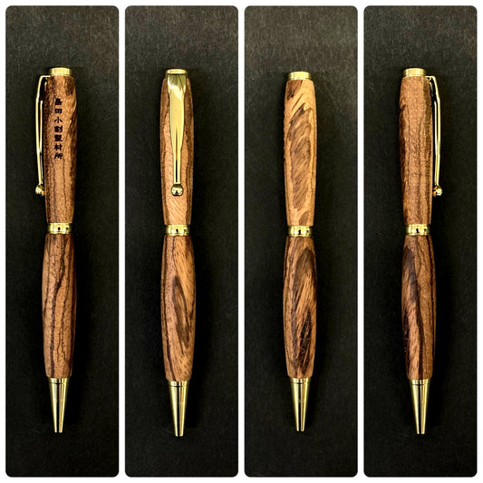 Handmade Shimada Kogawase Zebra Wood ballpoint pen Model 001BP with dark brown striped grain pattern