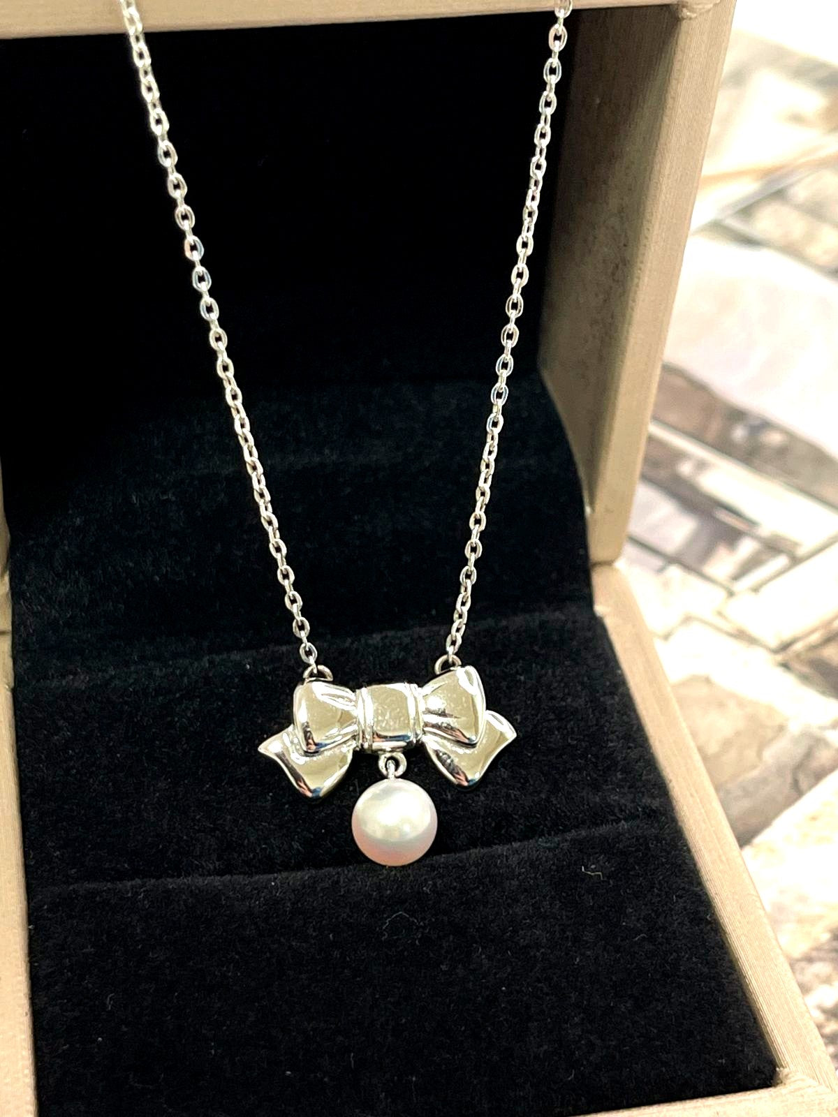 Mikimoto silver necklace with 6.5mm pearls weighing 3.5g, 38cm length