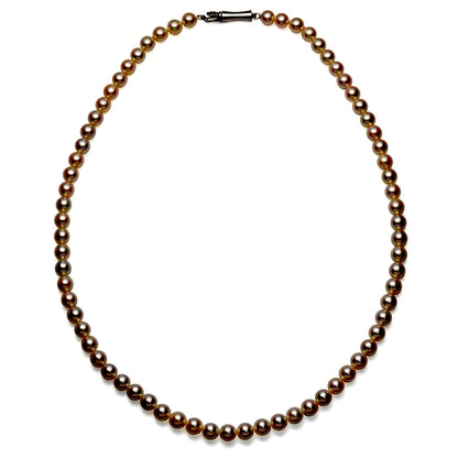 Akoya pearl necklace with small 5.5-6mm pearls on a 42cm strand featuring a silver clasp