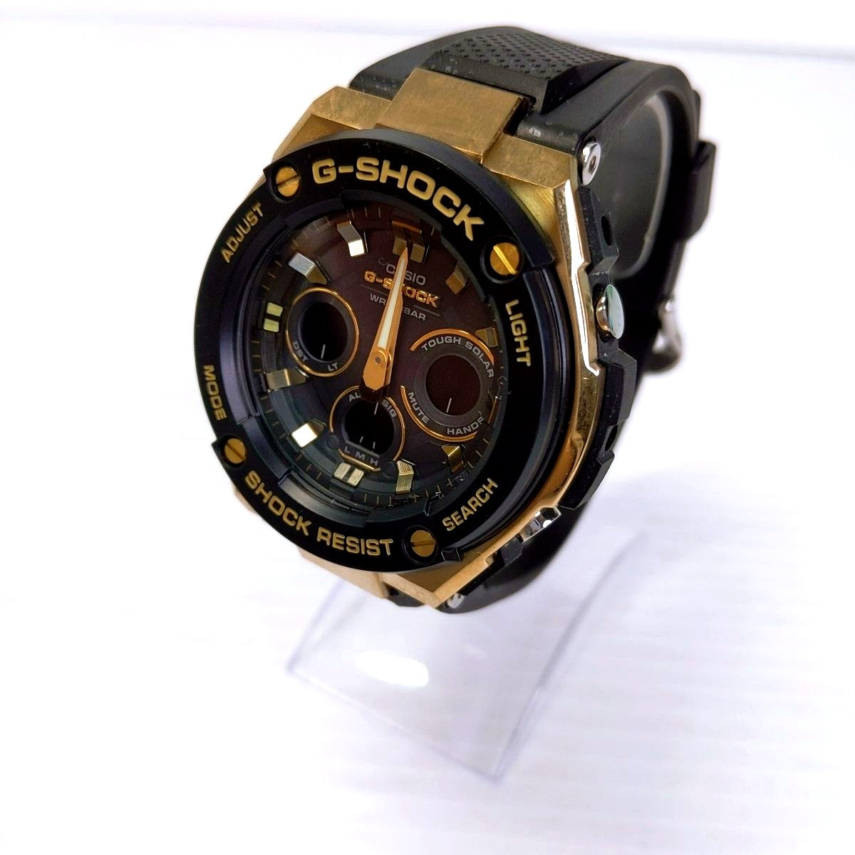 Used Casio G-Shock GST-W300G-1A9JF men's gold watch with visible minor scratches