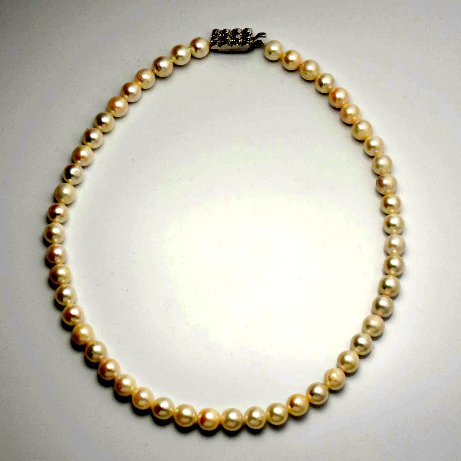 Akoya pearl necklace featuring 8-8.5mm round pearls on a 42cm string with silver clasp