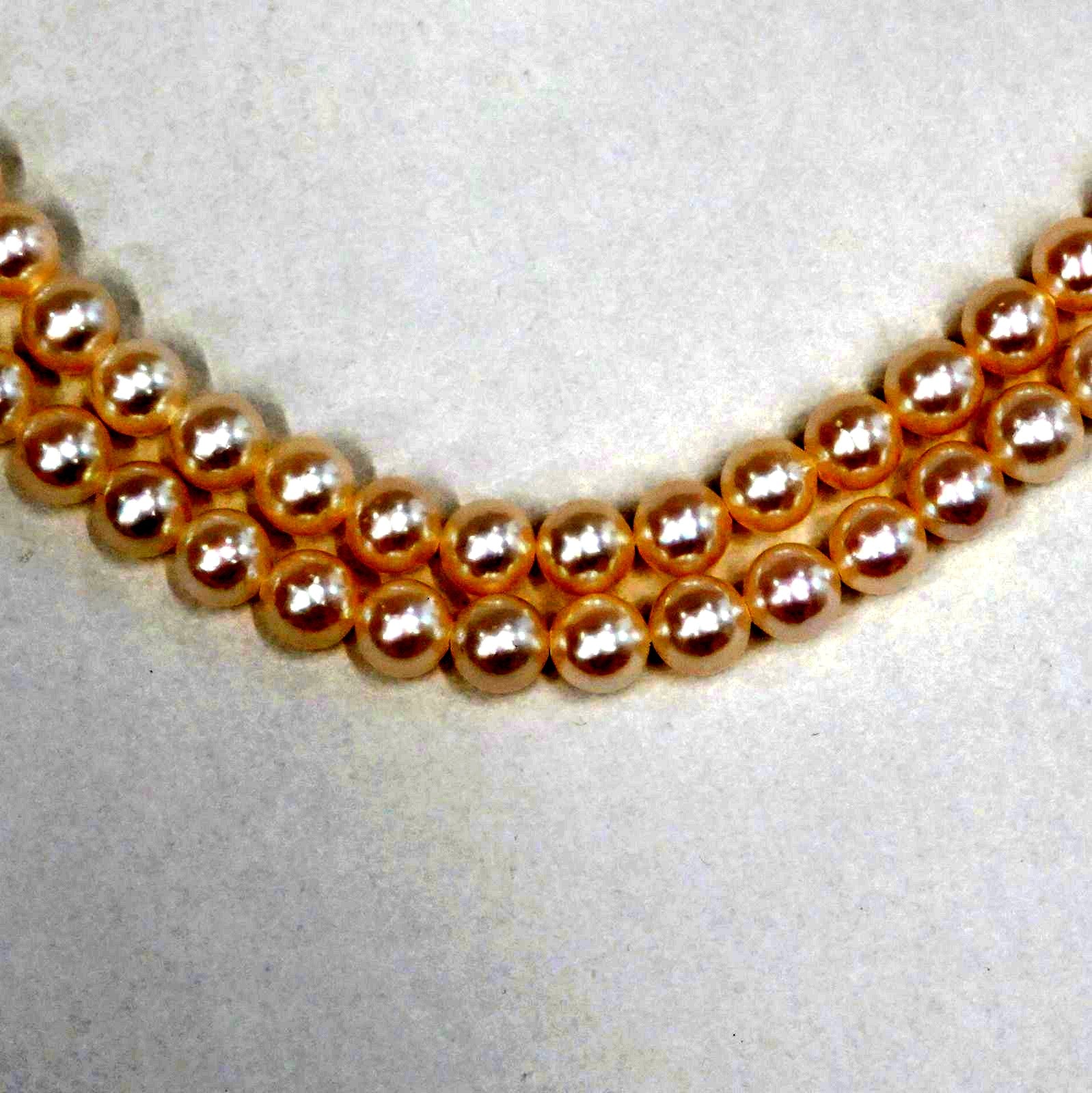 Tasaki Akoya pearl long necklace with 6.5-6.8mm pearls and silver clasp measuring 122cm
