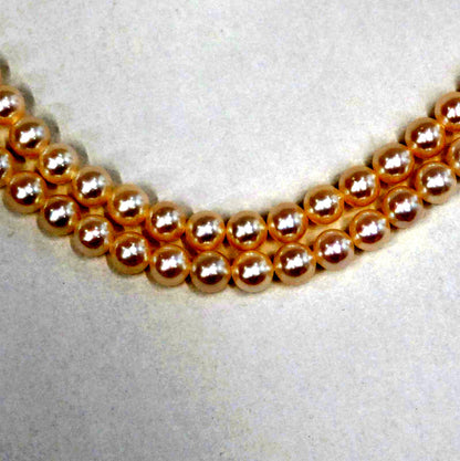 Tasaki Akoya pearl long necklace with 6.5-6.8mm pearls and silver clasp measuring 122cm
