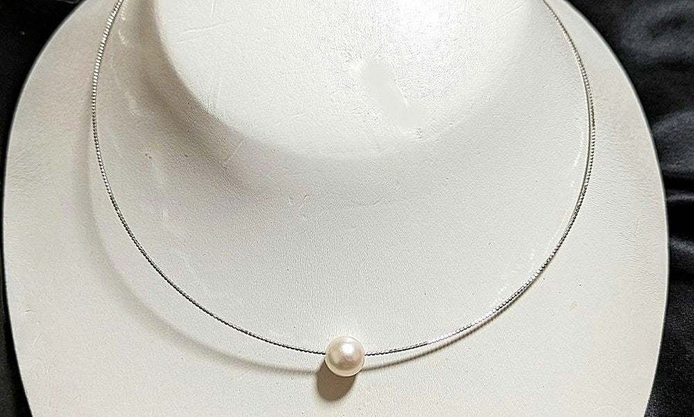 Akoya pearl Omega thread necklace with 9.5mm-9mm white slight pink round pearls and thick wrap