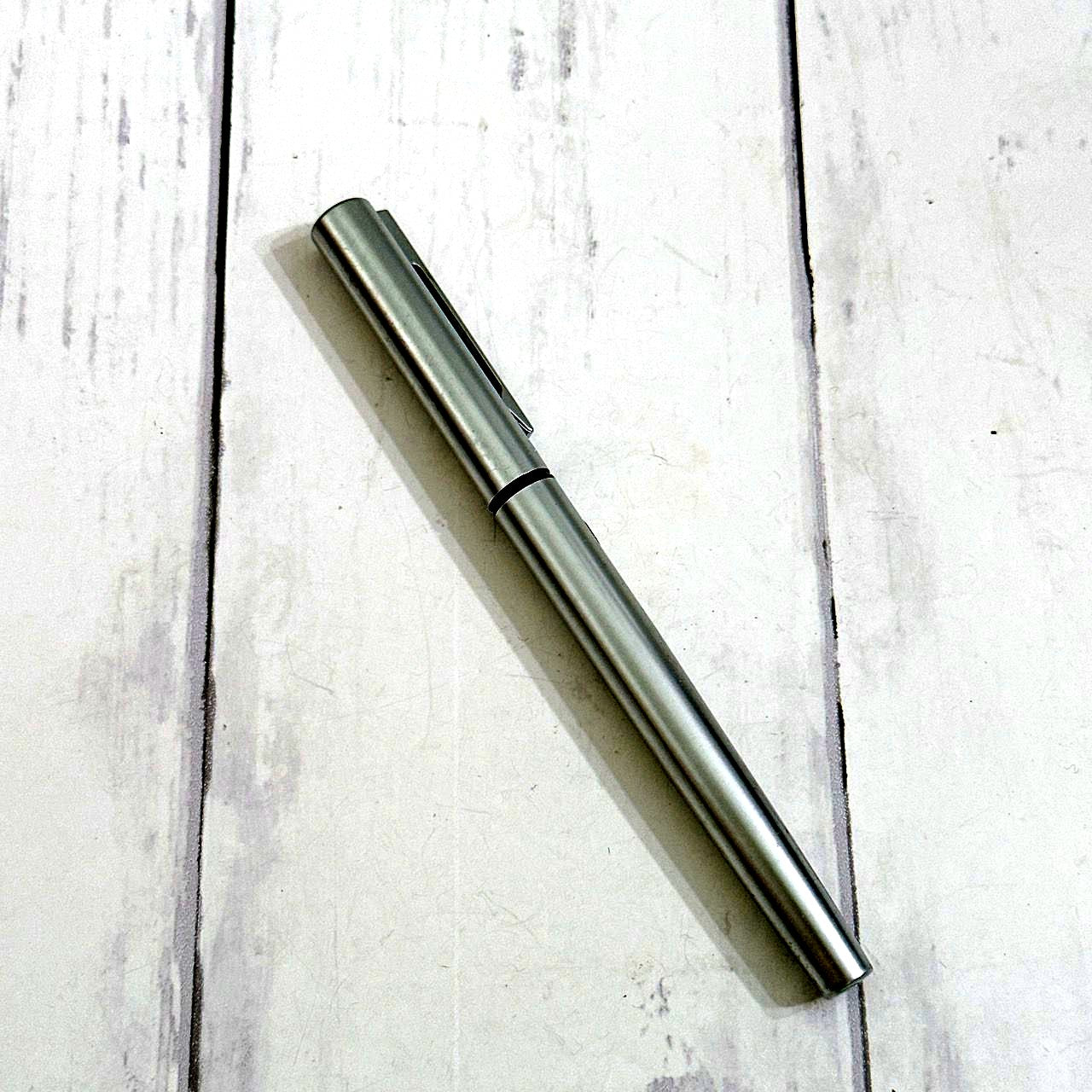 Waterman EF fountain pen with sleek black body and silver trim shown on white background