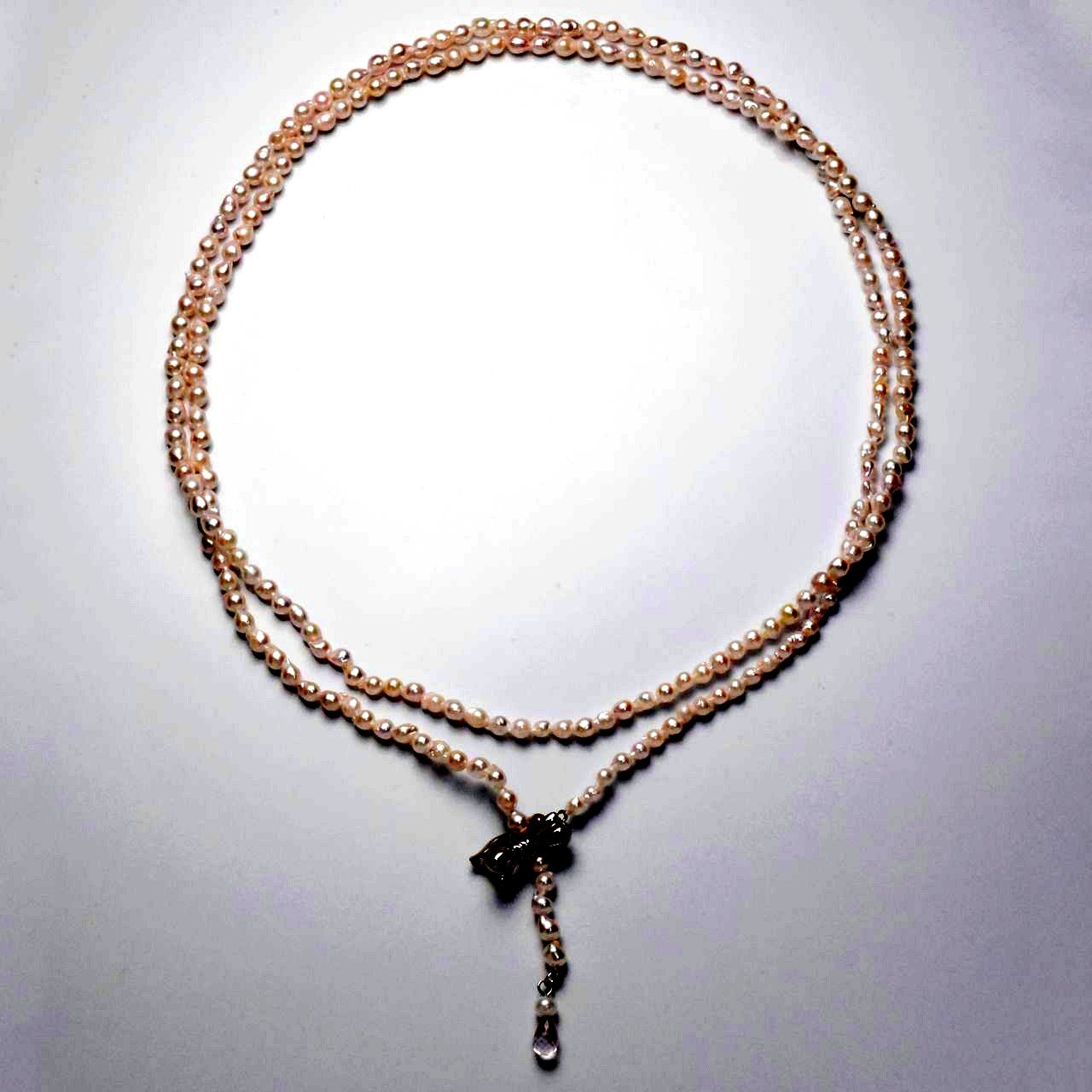 Baroque shape Akoya pearl necklace with 3-3.5mm pearls and rose quartz ribbon clasp, 80cm long