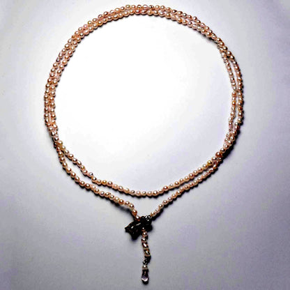Baroque shape Akoya pearl necklace with 3-3.5mm pearls and rose quartz ribbon clasp, 80cm long