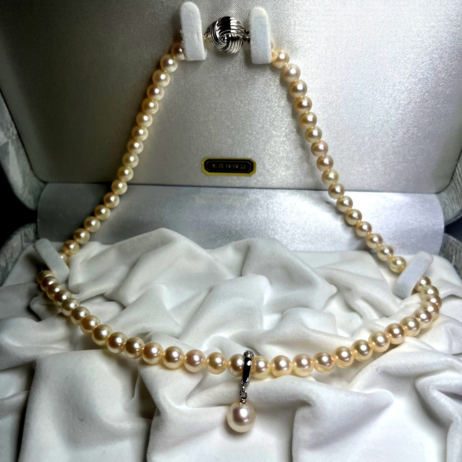 Akoya genuine pearl necklace with 6.0-6.5mm pearls and sterling silver fittings displayed with case