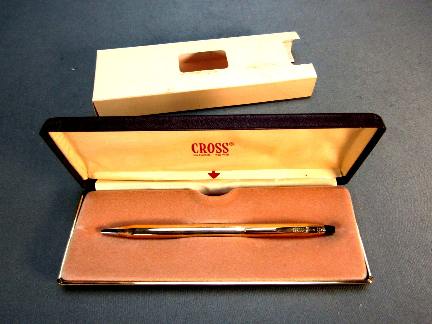 Cross 10K gold-plated ballpoint pen model 4502 with black ink in used condition with cardboard box showing dirt