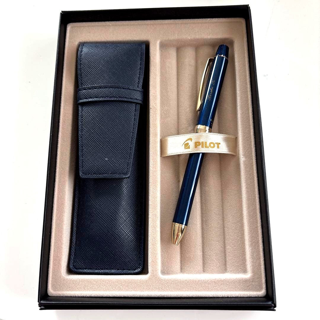Pilot multi-function pen in navy color with a protective case displayed
