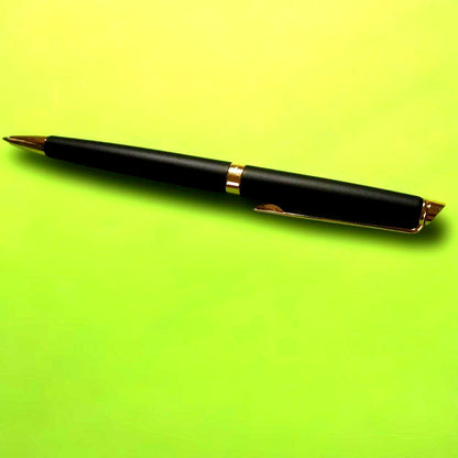 WATERMAN ballpoint pen in matte black with gold trim shown on white background