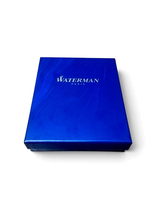 WATERMAN ballpoint pen with black body and blue dedicated pen case set on white background