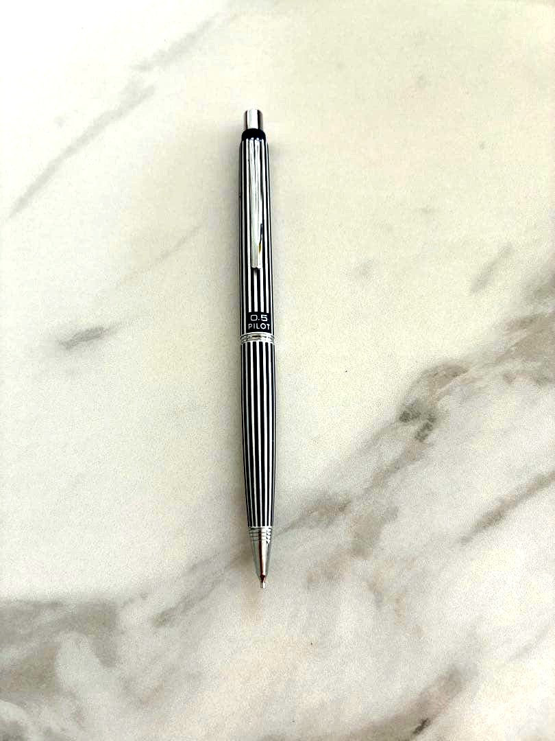Close-up of a Pilot mechanical pencil in excellent condition, lightly used