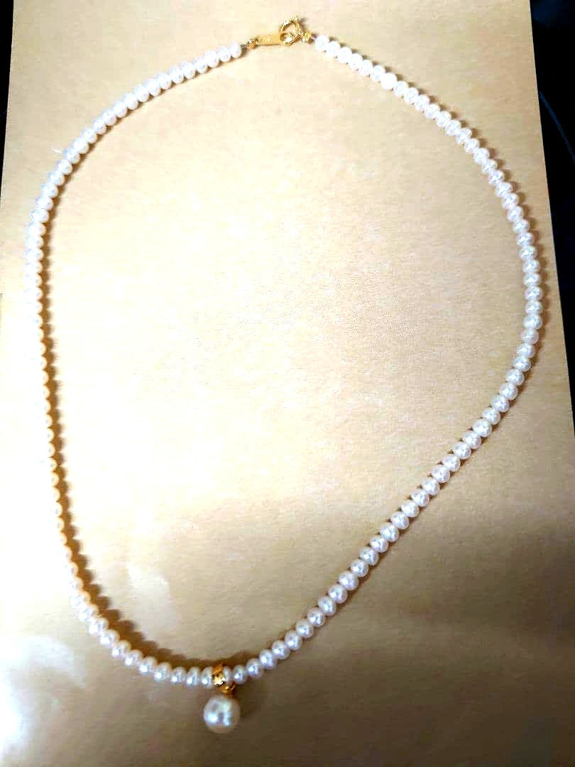 K18 Pearl Necklace with Akoya pearls and K18 clasp displayed on a white background