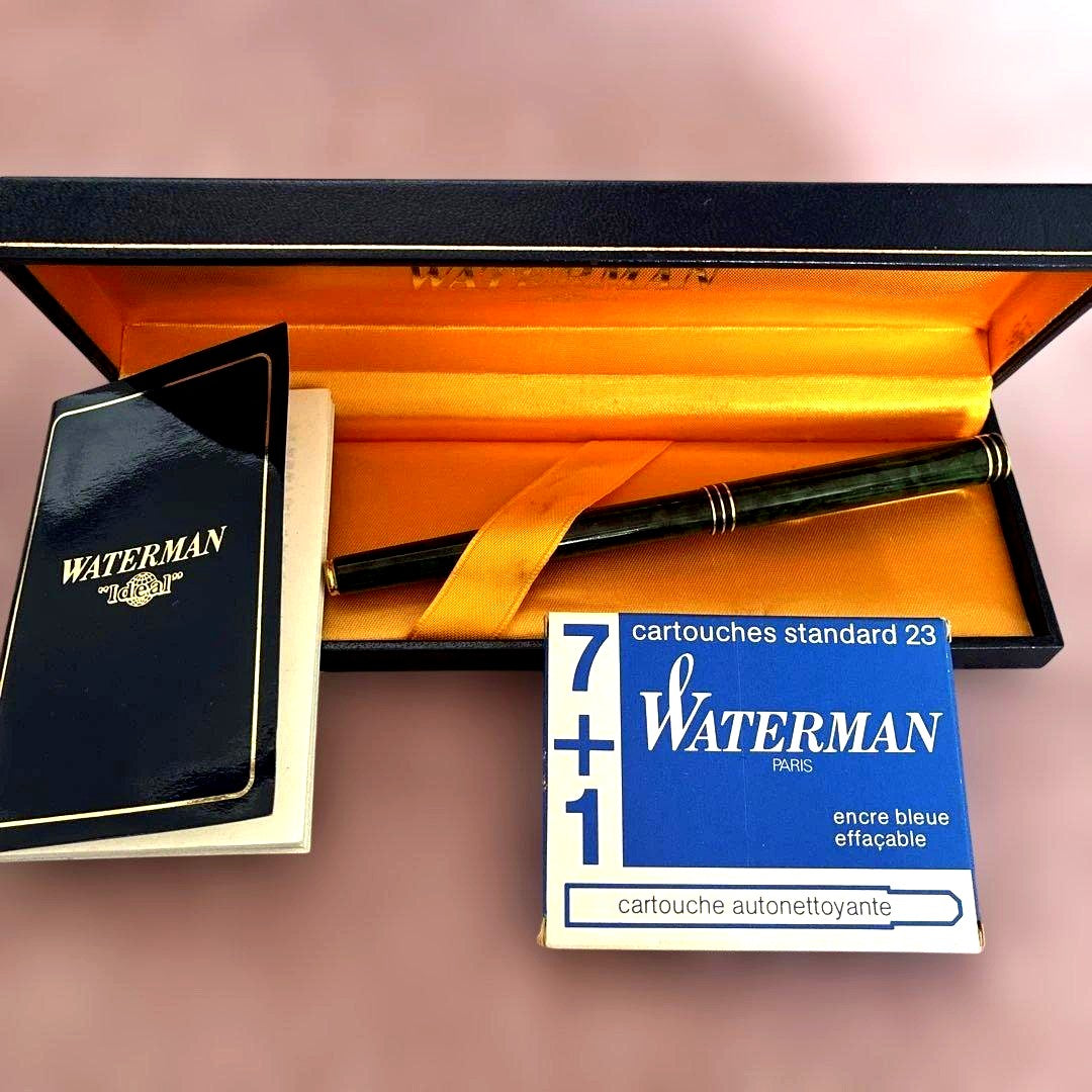 Waterman IDEAL fountain pen in marble green resin with 18K gold nib, displayed with box and ink cartridge