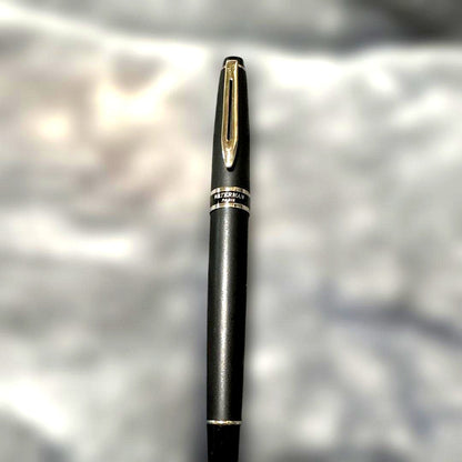 WATERMAN PARIS black fountain pen with stainless steel tip shown on white background