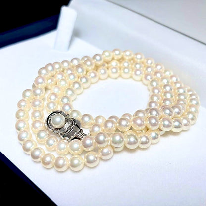 Akoya Pearl Long Necklace 75cm with round 5.6-5.9mm white pearls on a white background